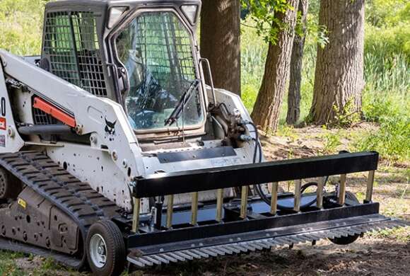 ABI SR2 Rake on Skid Steer