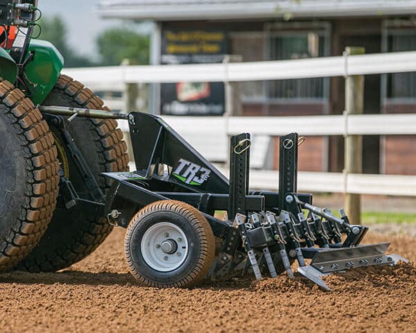For natural arena renovation, the TR3 is ideal, being dragged while attached to a green tractor.
