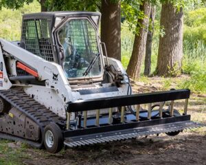 ABI SR2 Rake on Skid Steer