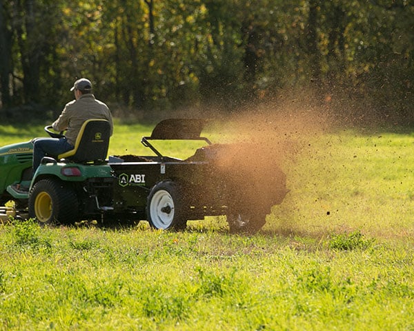 ABI's Manure Spreader shredding and spreading manure.