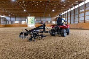 SportPro M1 being displayed and used in a indoor synthetic footing arena.