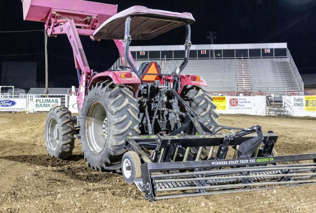 TR3 Rodeo Arena Drag by ABI Attachments, featuring a rolling basket for breaking up footing, adjustable hydraulic scarifiers, auto-leveling blade, 3/4″ hardened steel finish rake, and foam-filled stabilizing wheels for consistent arena grooming.