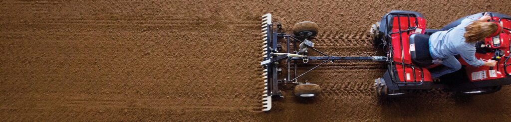 ATV/UTV attachment in use in the soil.