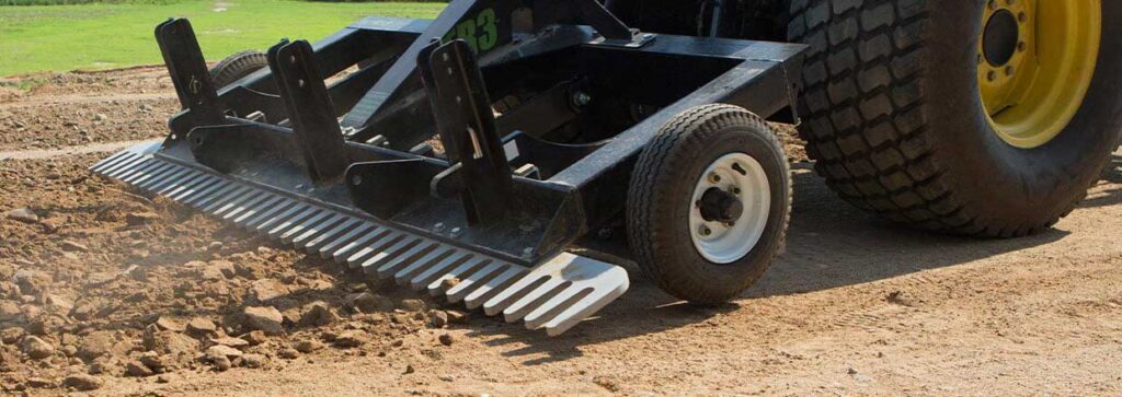 TR3 tractor attachment in use in soil.
