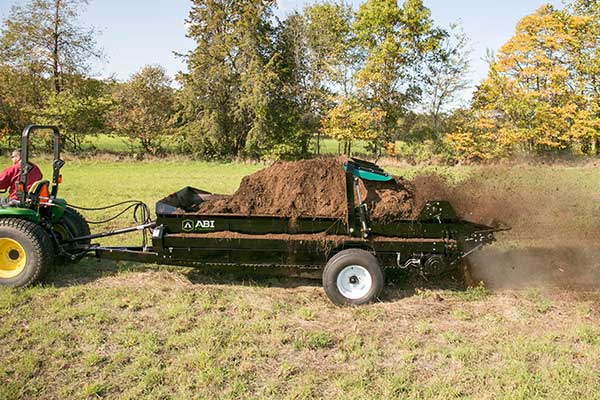 Manure Spreader PTO shredding and spreading manure.