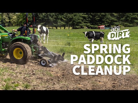 The phrase ‘Spring Paddock Cleanup’ appears in the bottom right, with 'ABI Dirt' shown in the top right of the image. A TR3 and a green tractor with 2 cows are in the background.