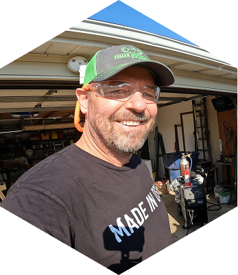 Joe Kapitany from Kapper Outdoors in front of an open garage